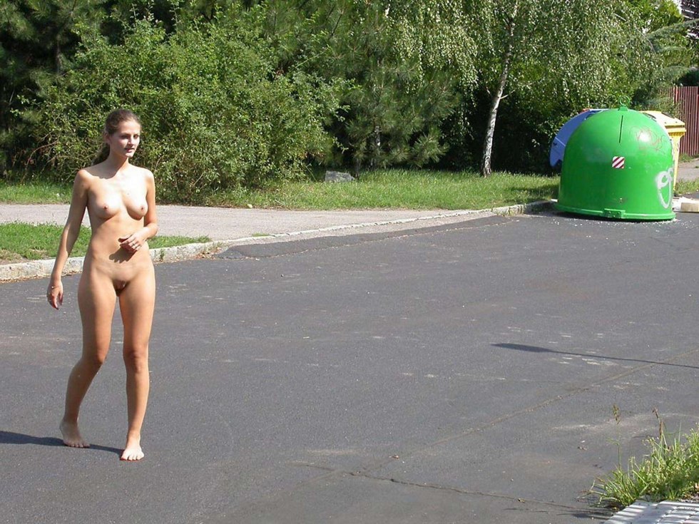 Naked woman walks on the street
