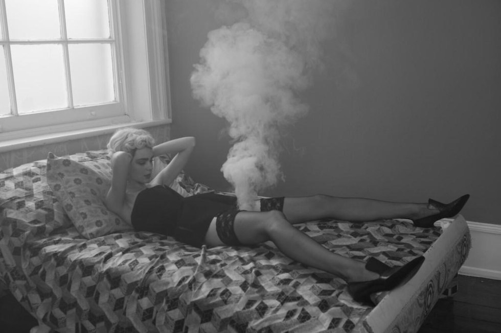 The girl smokes