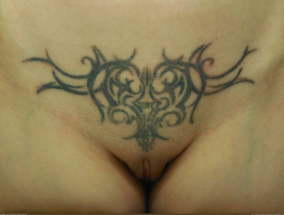 Erotic pubic tattoo