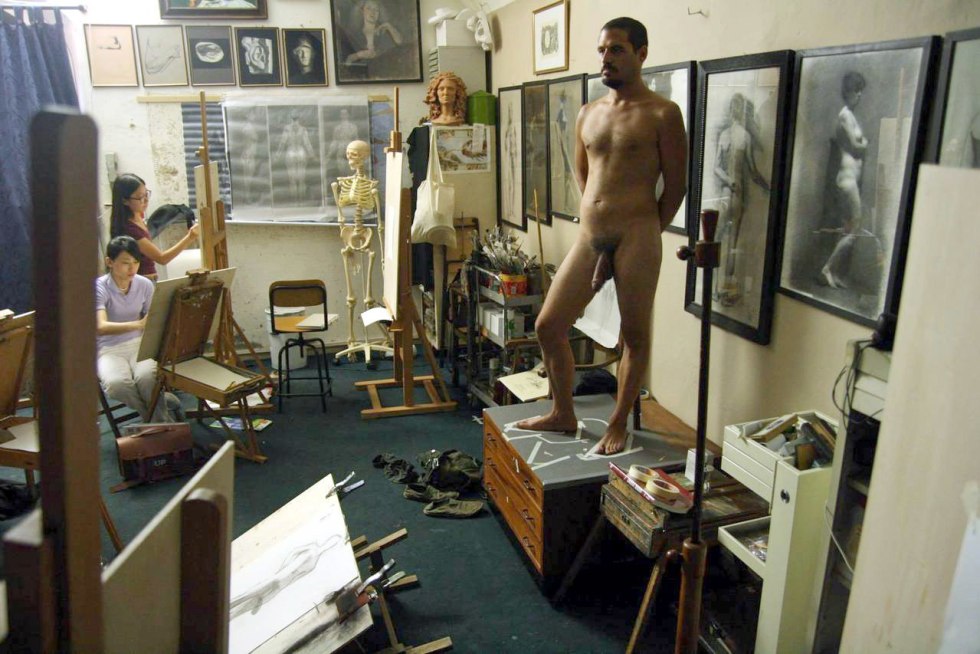 A naked man poses artists