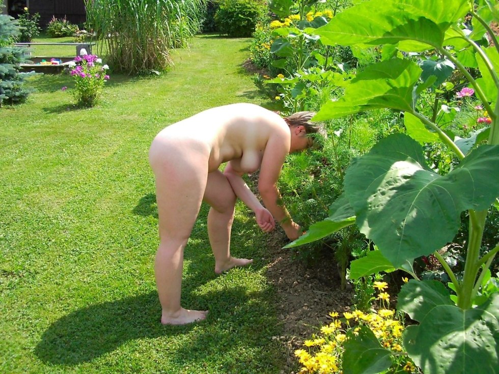 Naked women on the beds of the garden