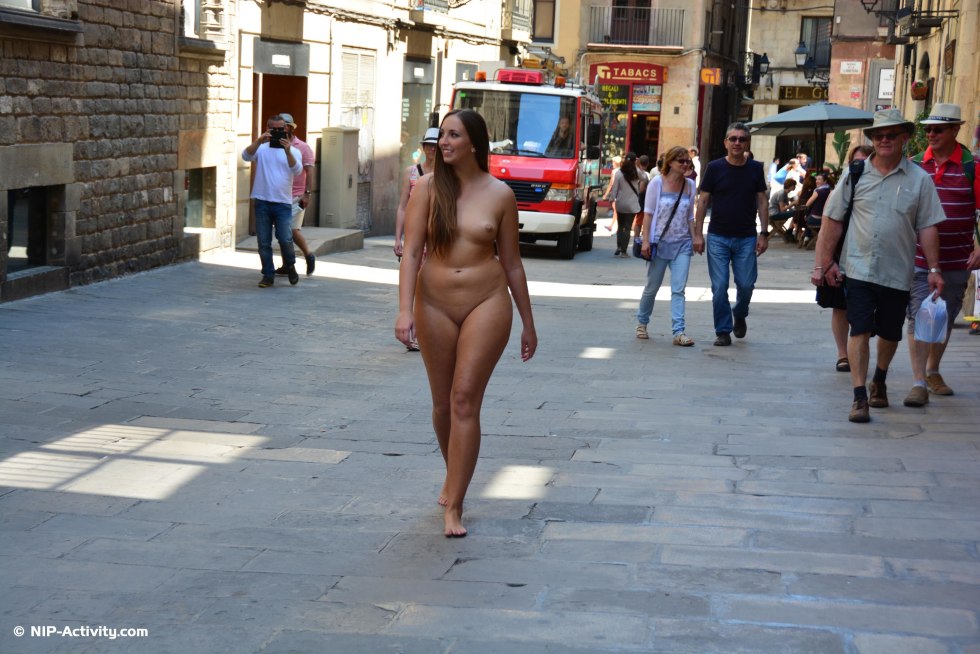 Naked women walk on the street