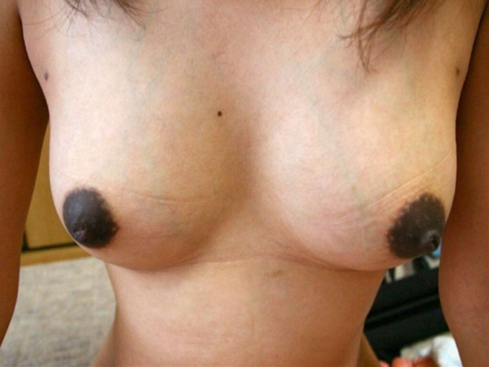 Breasts with brown nipples