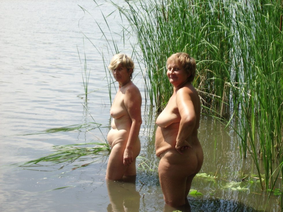 Naked women in the age on the river