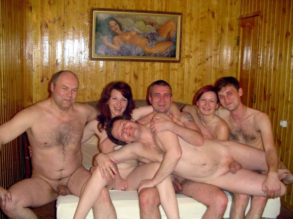 Naked women in a bathhouse with men