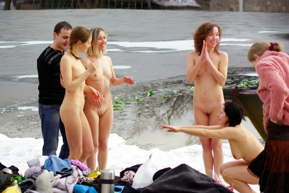 Naked girls bathed in an ice hole
