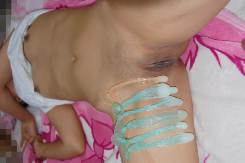 Cums in a condom girl