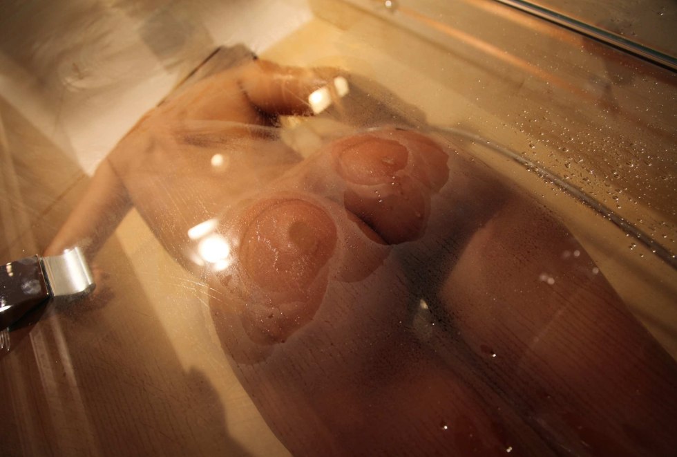 Erotic girls behind glass