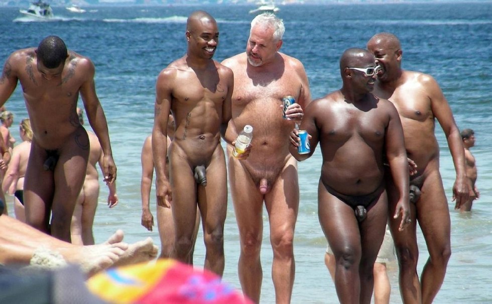 Naked black man on the beach