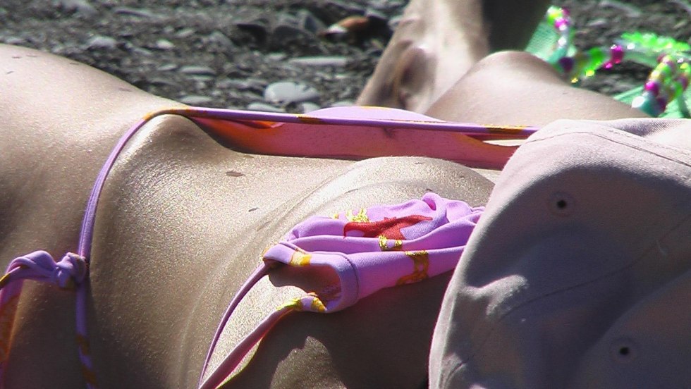 Hair from under the swimsuit