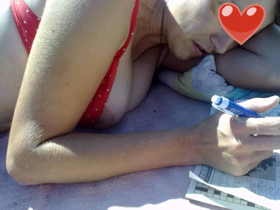 Tits from a swimsuit on the beach fell out