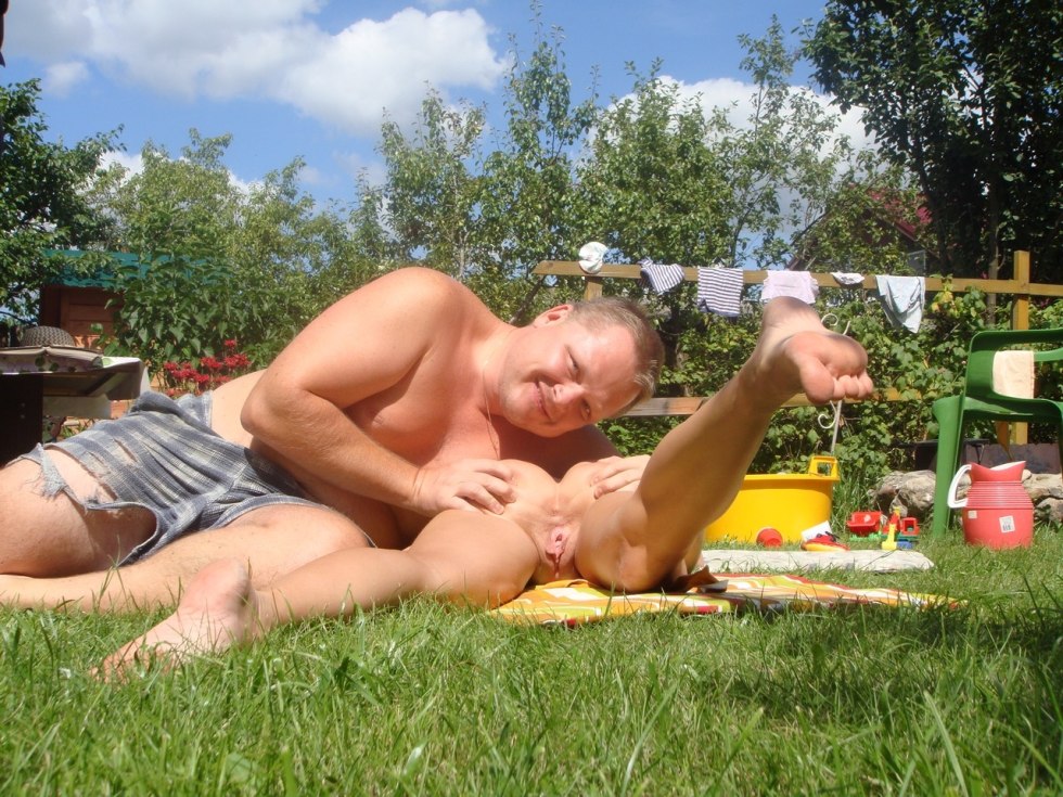 Naked women on the beds of the garden