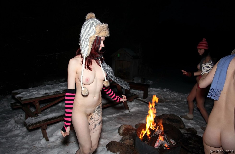 Naked ass by the fire in winter