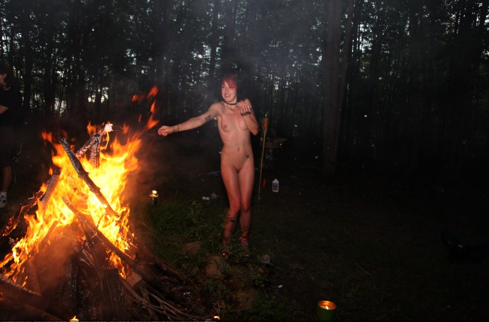 Erotic photo shoot by the fire
