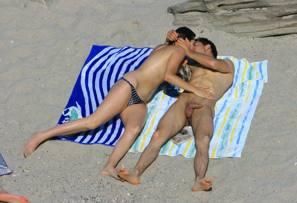 Naked couples on the beach