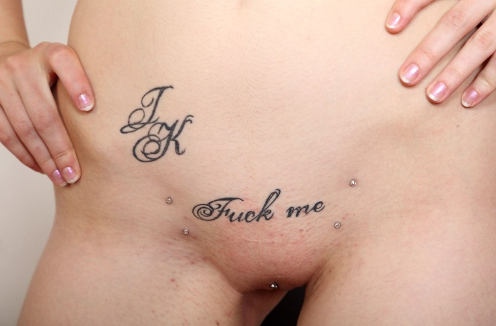 Pubic tattoo in girls inscription