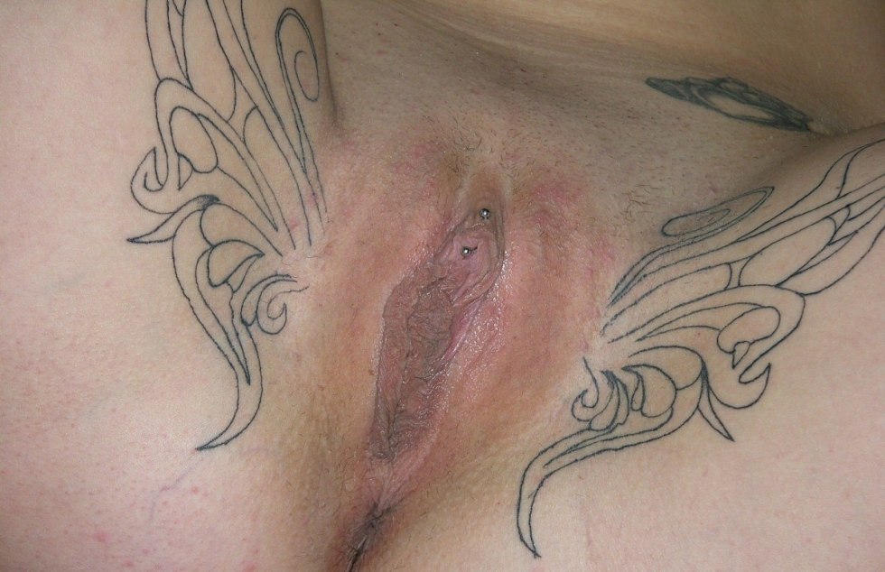 Women's intimate tattoos on the anus