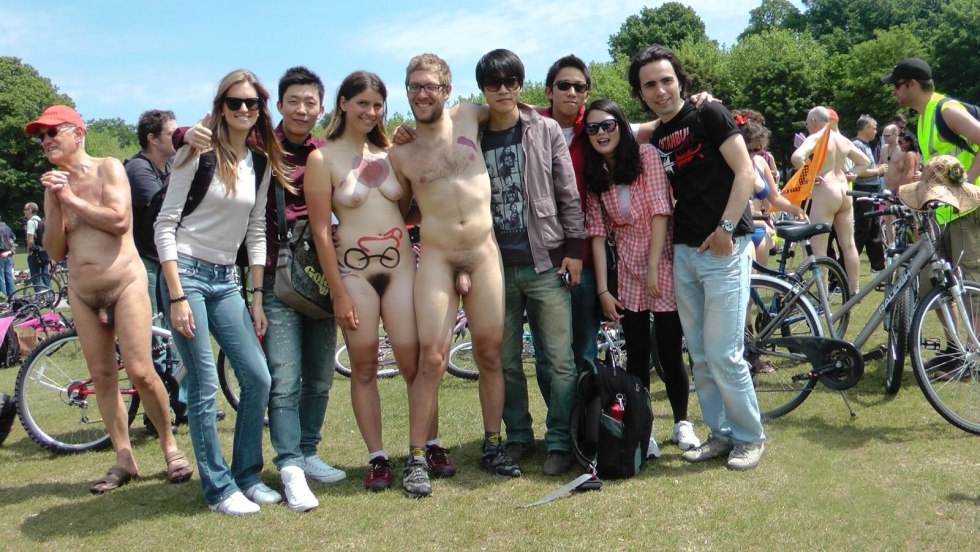 Naked women among dressed men