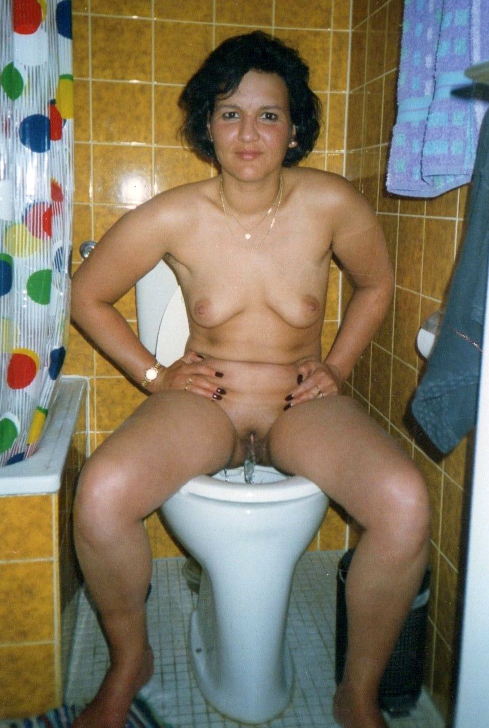 Naked mature women in the toilet
