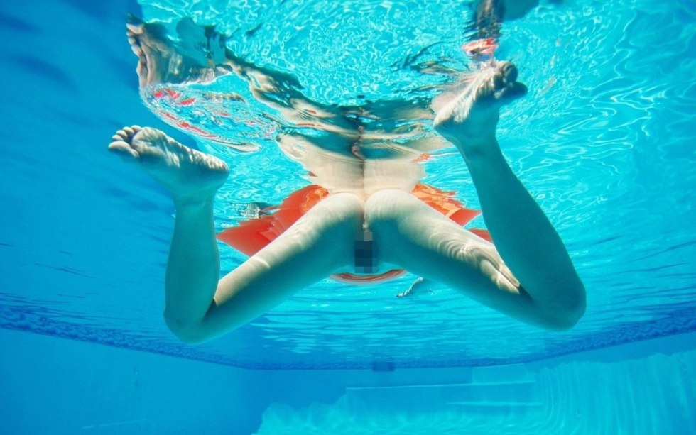 Girl in a water park without panties