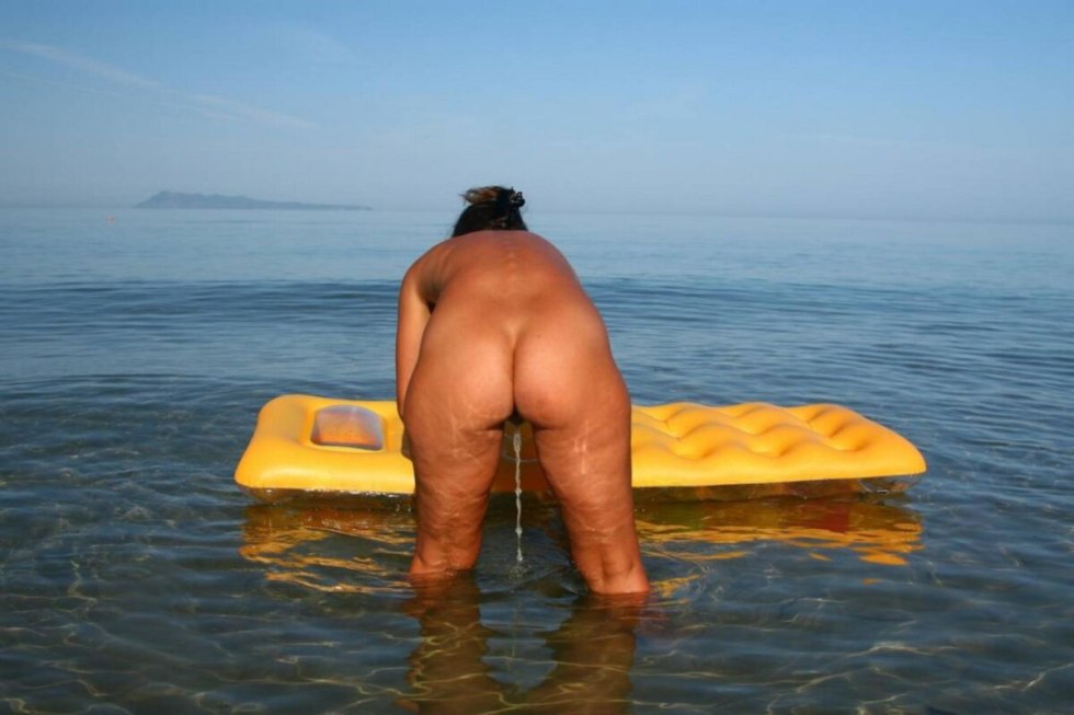 Fat women on the beach without panties