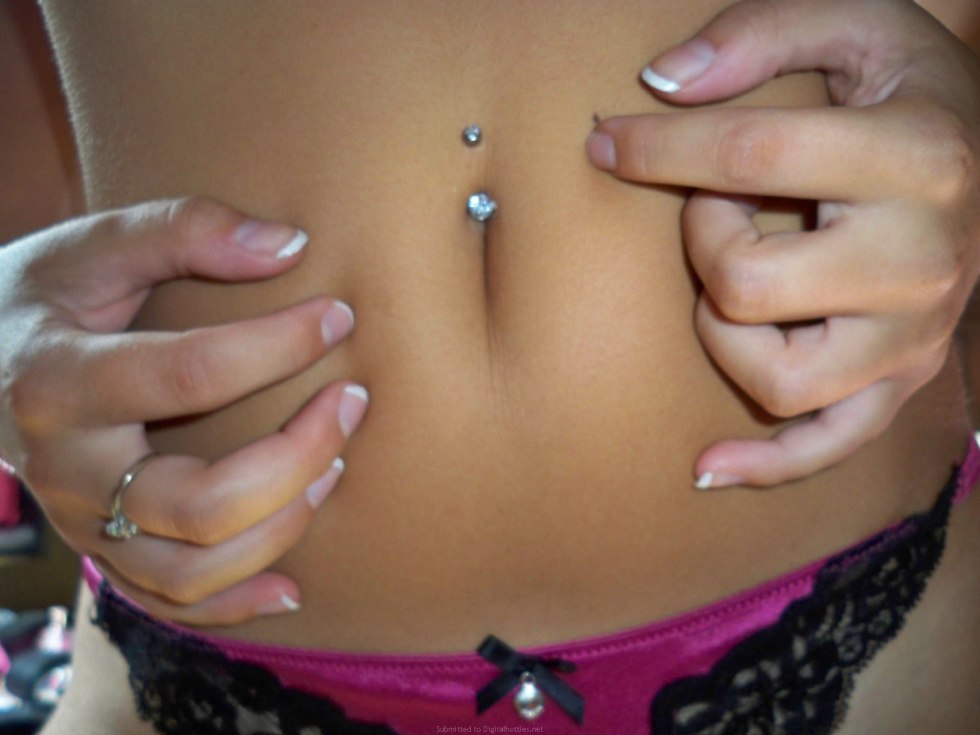 Girl with piercing in her navel