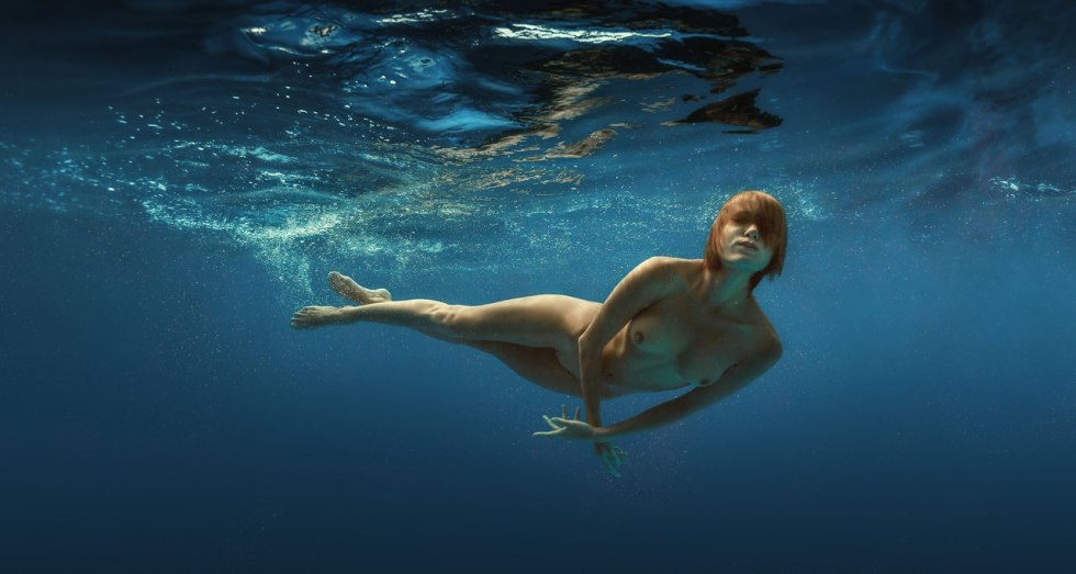 Underwater shooting of naked women