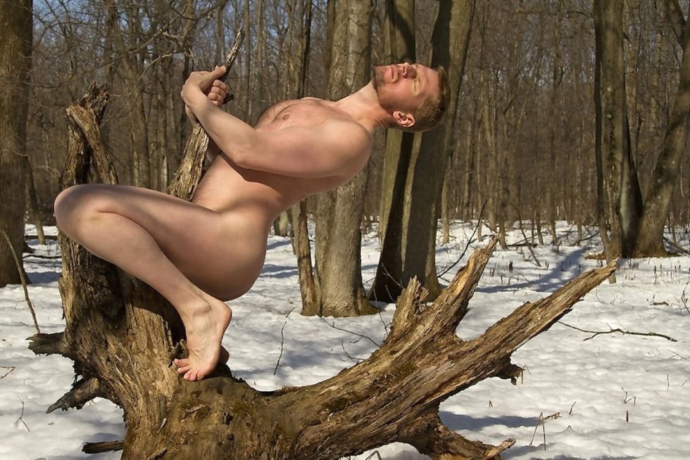 Naked men in the winter forest