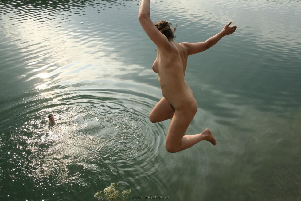 Girls jump into the water naked