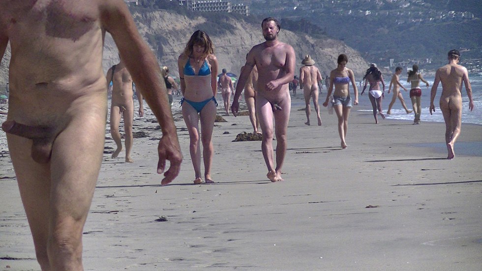 Naked men on a public beach