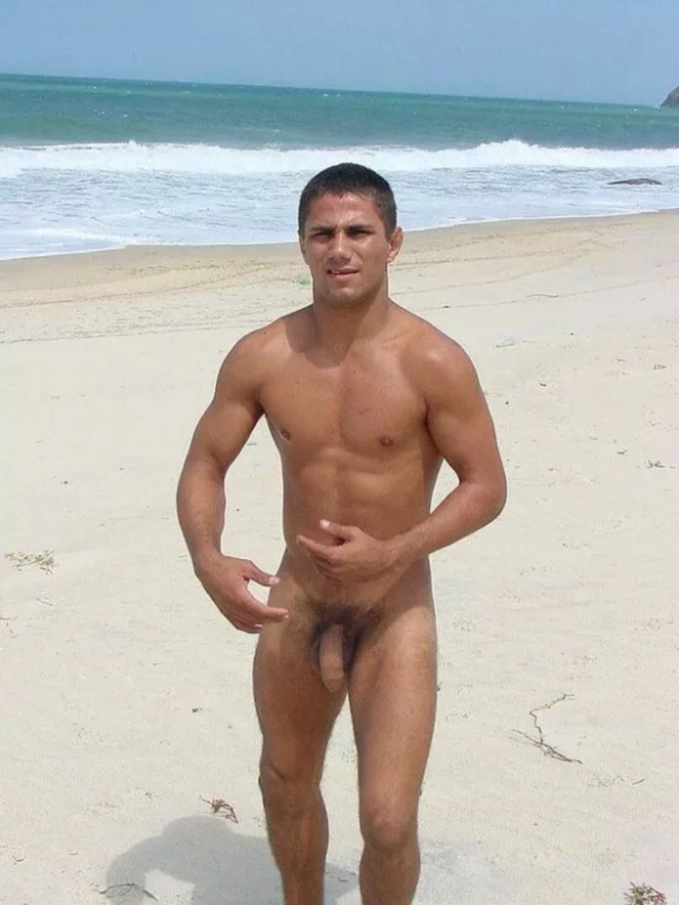 Beautiful naked guys on the beach