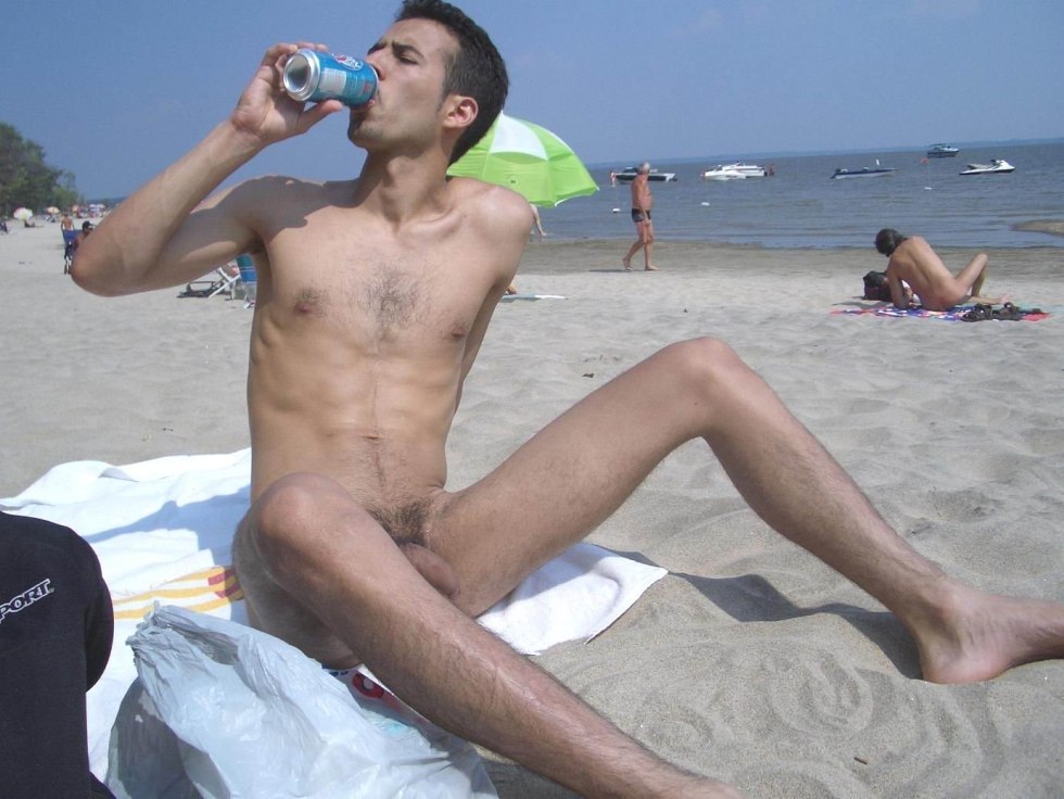 Naked young guys on the beach