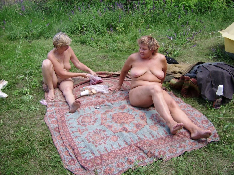 Old woman in nature naked