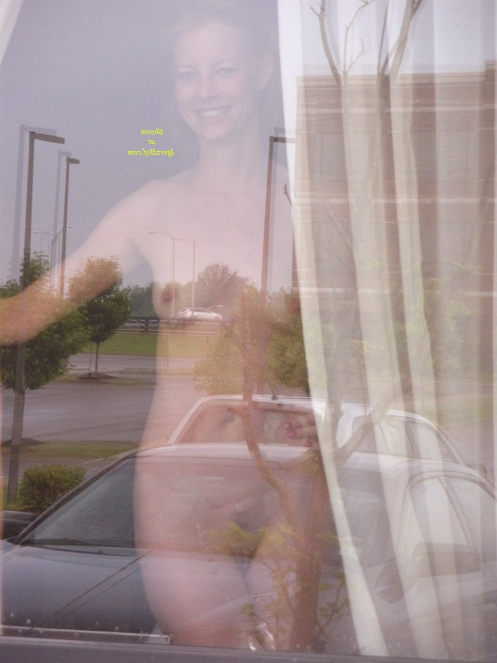 Reflection in the window naked
