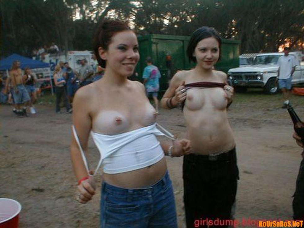 Women show their breasts on the street