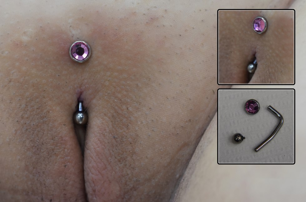 Piercing of the hood of the clitoris