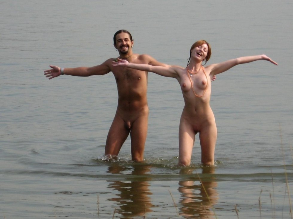 Man and woman swim naked
