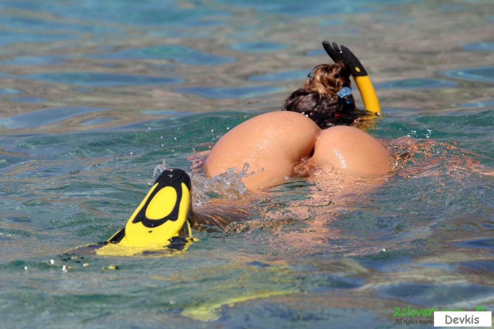 Naked divers underwater