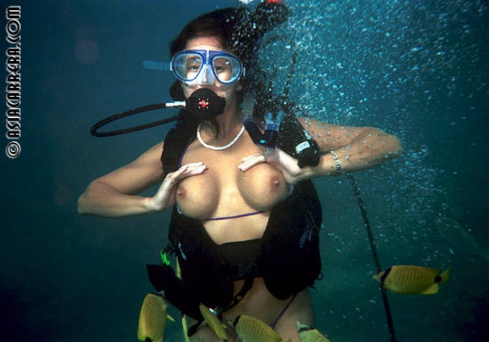 Naked with scuba dummy underwater