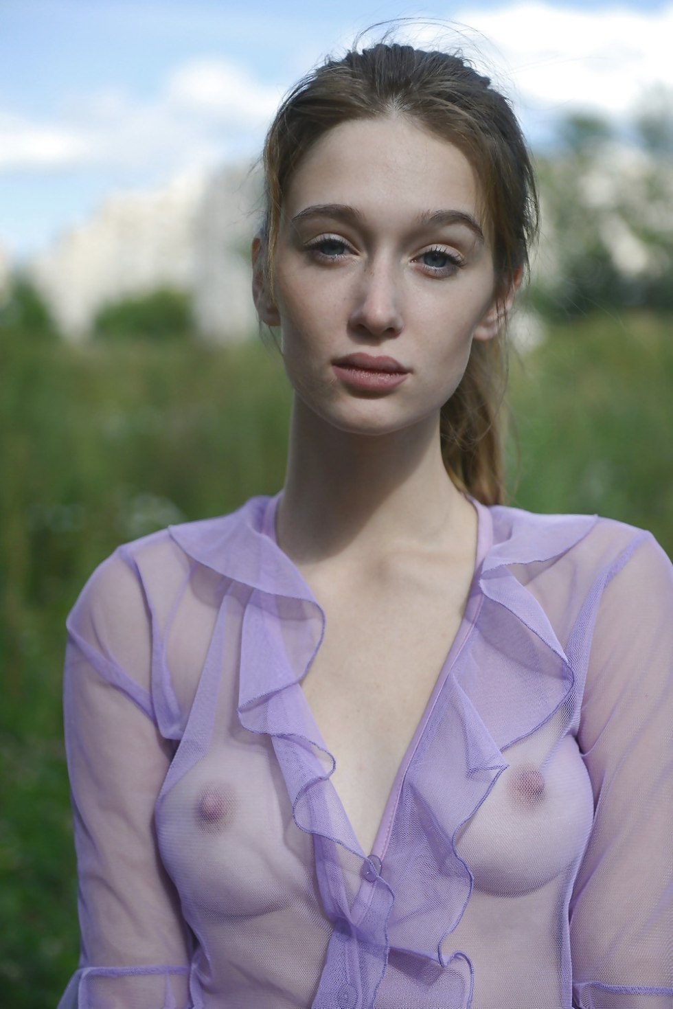 Women in transparent blouses without a bra