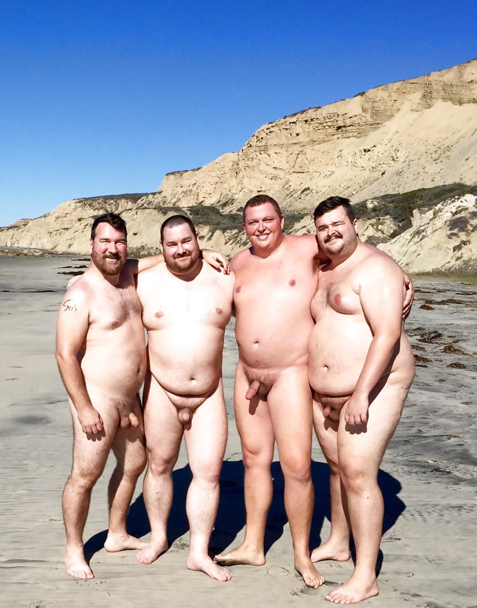 Fat man naked on the beach