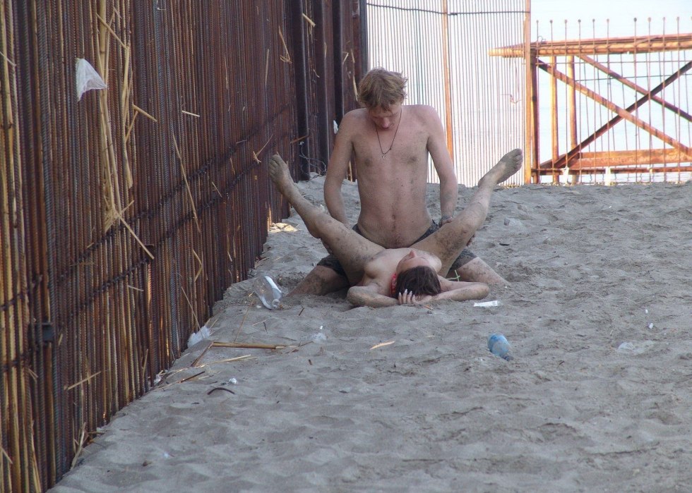 Naked guys on the beach fuck