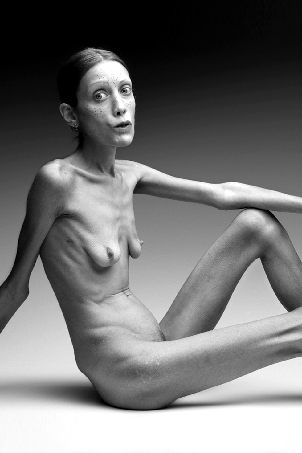 The skinny anorexic is naked