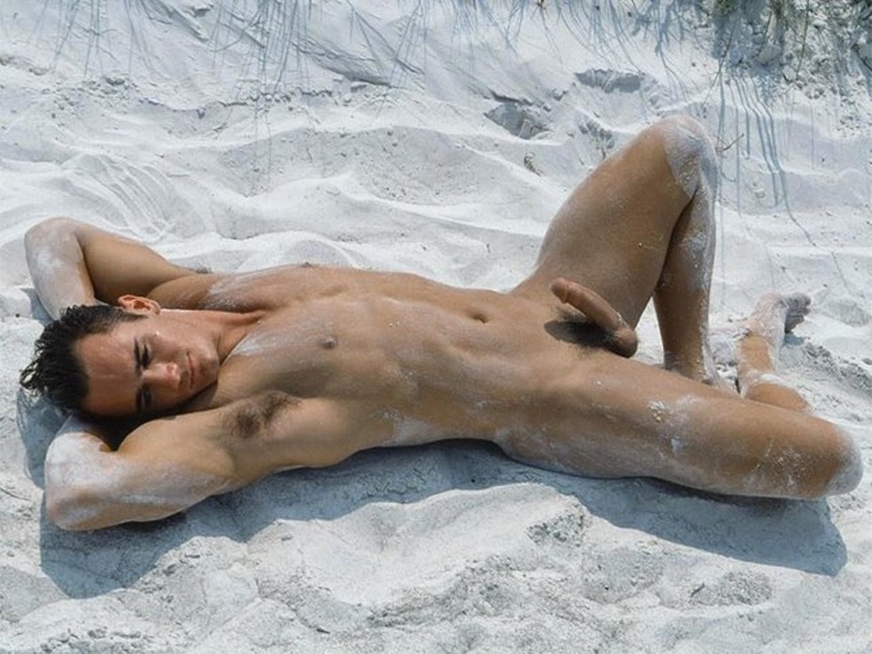Beautiful naked men on the beach