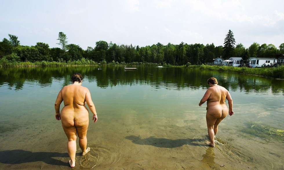 Fat bathes in the nude river