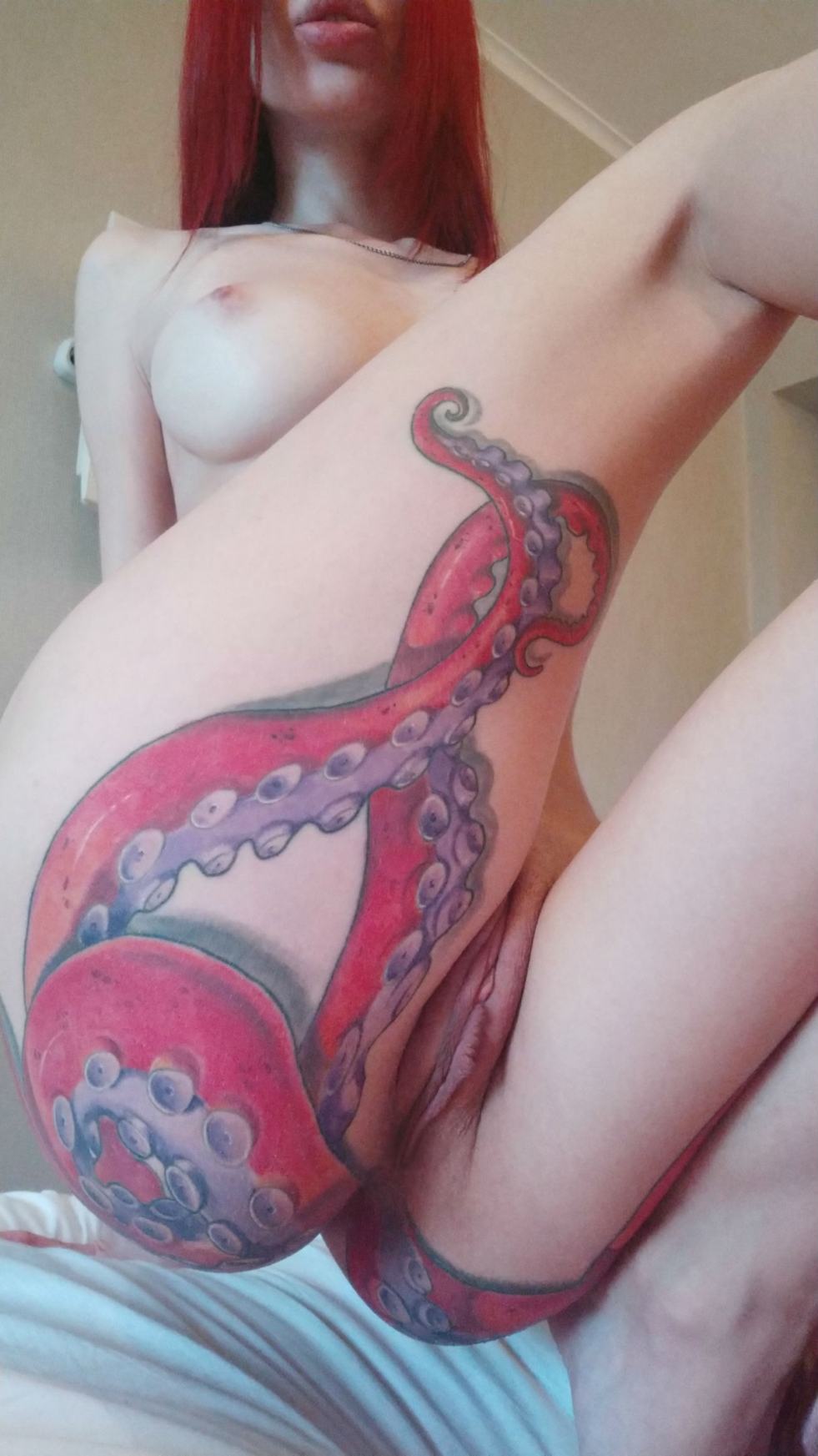 Octopus tattoo on vagina