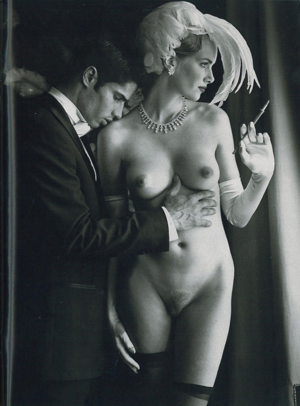 Naked smokes on the toilet