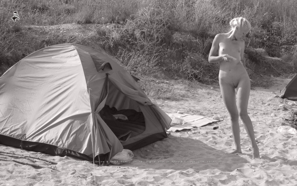 Naked blonde in a tent
