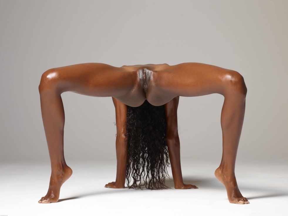 Naked black woman on the bridge