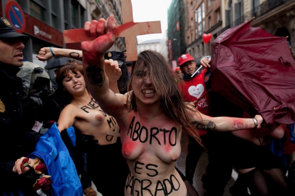 Feminists with bare breasts